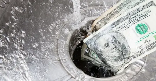 Money and water going down the drain